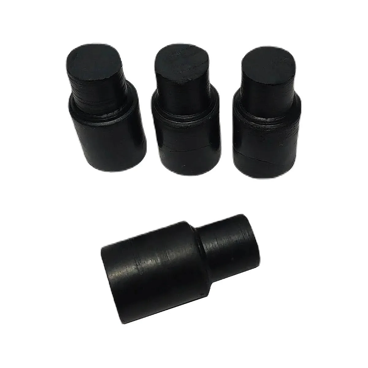 Vier rubberen dopjes voor een bokspaal.